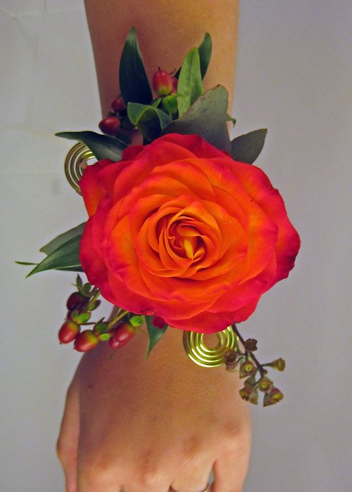 Orange wrist corsage